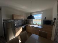 Kuchyňa alebo kuchynka v ubytovaní Dióliget Cottage Sárvár