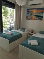 Posteľ alebo postele v izbe v ubytovaní Aprum Apartments 12C