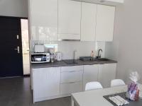 Kuchyňa alebo kuchynka v ubytovaní Aprum Apartments 12C