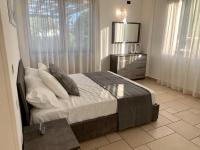 A bed or beds in a room at Torre dei Mori Boutique Rooms B&B