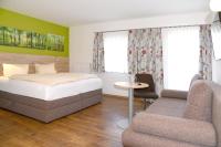 Posteľ alebo postele v izbe v ubytovaní Landhotel Reitingblick