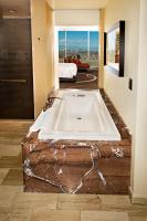 Ein Bett oder Betten in einem Zimmer der Unterkunft M Resort Spa &amp; Casino