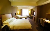 Postelja oz. postelje v sobi nastanitve City Suites-Taipei Nanxi