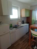 Kuchyňa alebo kuchynka v ubytovaní Apartmani Palmas Rijeka