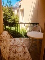 En balkon eller terrasse p&aring; Villa Abeona
