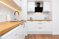 Kuchyňa alebo kuchynka v ubytovaní Apartments Gdańsk Starowiejska by Noclegi Renters