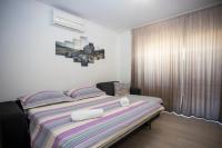 Postel nebo postele na pokoji v ubytování Apartment San Marino