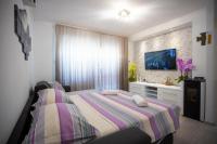Postel nebo postele na pokoji v ubytování Apartment San Marino