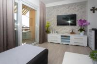 TV a/nebo společenská místnost v ubytování Apartment San Marino