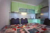Kuchyň nebo kuchyňský kout v ubytování Apartment San Marino