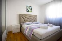 Postel nebo postele na pokoji v ubytování Apartment San Marino
