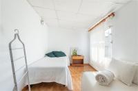 Łóżko lub łóżka w pokoju w obiekcie Can Calafat
