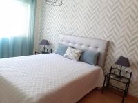 Postel nebo postele na pokoji v ubytování Apartamento Alfarrobeira Mar