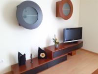 TV a/nebo společenská místnost v ubytování Apartamento Alfarrobeira Mar