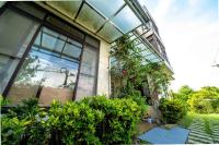 a building with plants on the side of it at My Sweetie B&amp;B in Dongshan