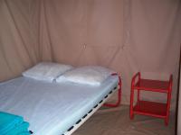 Krevet ili kreveti u jedinici u okviru objekta Camping Au Bois Dormant