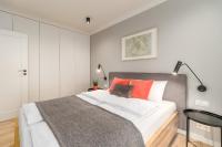 Łóżko lub łóżka w pokoju w obiekcie BellMi Apartamenty - Parking Gratis, Plaża 5min, Komfort i Relaks