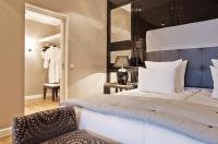 Postel nebo postele na pokoji v ubytování Nimb Hotel