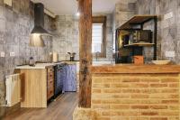A kitchen or kitchenette at La Casa de Nini