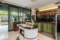 Kuchyň nebo kuchyňský kout v ubytování Hotel Amber Sukhumvit 85