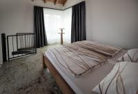 Postel nebo postele na pokoji v ubytování Ferienhaus Alte Glaserei
