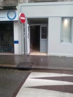 a red sign in front of a building at La Grande Marée in Dieppe