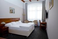 Postel nebo postele na pokoji v ubytování Wellness Hotel Ida