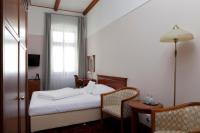 Postel nebo postele na pokoji v ubytování Wellness Hotel Ida
