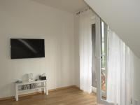 TV a/nebo společenská místnost v ubytování Apartman Honey