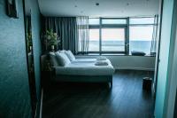 Un ou plusieurs lits dans un hébergement de l'établissement De Pier Suites