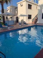 Bazén v ubytování Seashell Apartments nebo v jeho okolí