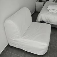 A bed or beds in a room at Nea Stira Studios Kondilia