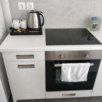 A kitchen or kitchenette at Nea Stira Studios Kondilia