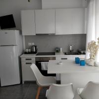 A kitchen or kitchenette at Nea Stira Studios Kondilia