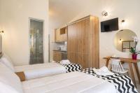 Posteľ alebo postele v izbe v ubytovaní Sunrise Rent Rooms