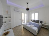 Posteľ alebo postele v izbe v ubytovaní Lux Sea Apartment - Porto Rafti