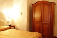 Łóżko lub łóżka w pokoju w obiekcie Hotel Torino
