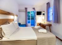 Postel nebo postele na pokoji v ubytování Nefeli Hotel