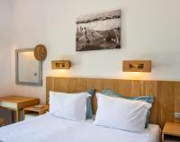 Postel nebo postele na pokoji v ubytování Nefeli Hotel
