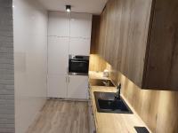 Kuchyňa alebo kuchynka v ubytovaní Apartament nad Sapiną