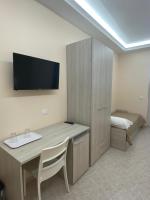 A television and/or entertainment centre at Vittorio Veneto Accomodation - Tropea city center