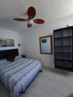 Posteľ alebo postele v izbe v ubytovaní Playa Torecilla Beachfront