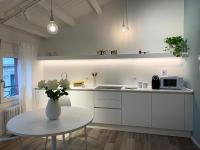 Kuchnia lub aneks kuchenny w obiekcie Al Sagraeto White apartment