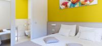 Posteľ alebo postele v izbe v ubytovaní DIEHOLIDAYBUCHT