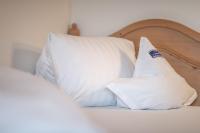 Posteľ alebo postele v izbe v ubytovaní Hotel Garni Schneider