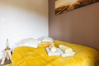 Posteľ alebo postele v izbe v ubytovaní Apartamenty Deja Vu Zakopane