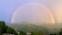 two double rainbows in the sky over a mountain at Julie&#39;s Garden, Cingjing - Fon Chin Homestay in Ren&#39;ai