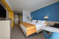 Posteľ alebo postele v izbe v ubytovaní Danubius Hotel Bük