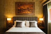 Łóżko lub łóżka w pokoju w obiekcie Lake Hotel La Pieve