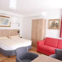 A bed or beds in a room at Appartement Katharina 2 Personen Hallein bei Salzburg